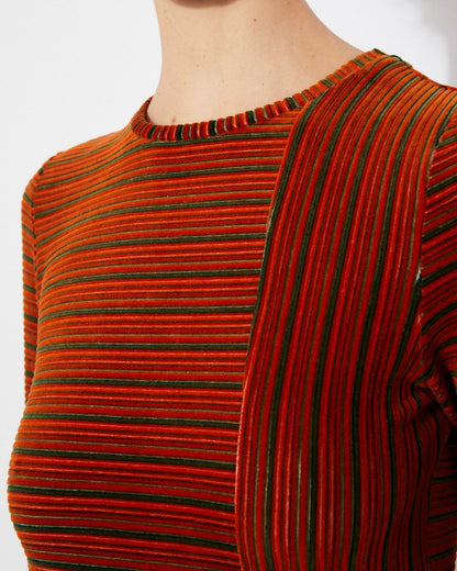 Long-sleeve velvet knit burnt orange rust Corba dres by Rita Row in Spain. Stripes and linework with a midi length and front slit.
