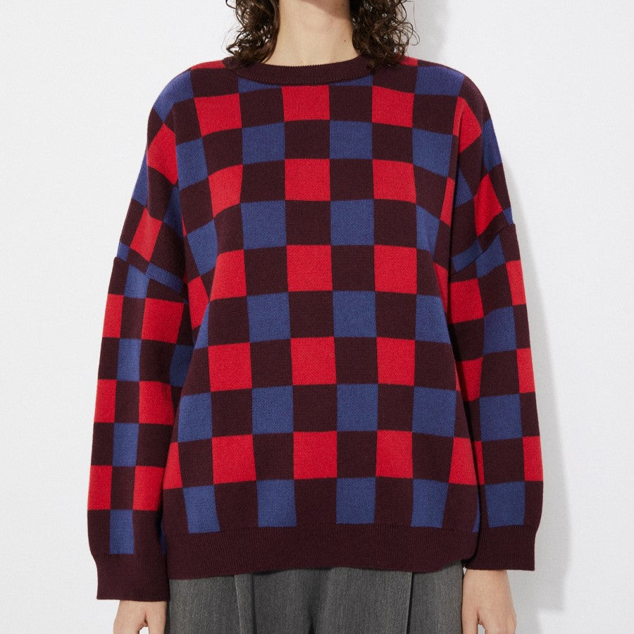 Freser checkered knit sweater with burgundy, blue, and poppy red made by Rita Row in Spain.