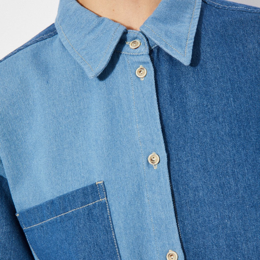 Patchwork denim blue button-down collar boxy shirt with short sleeves made by Rita Row in Spain. 