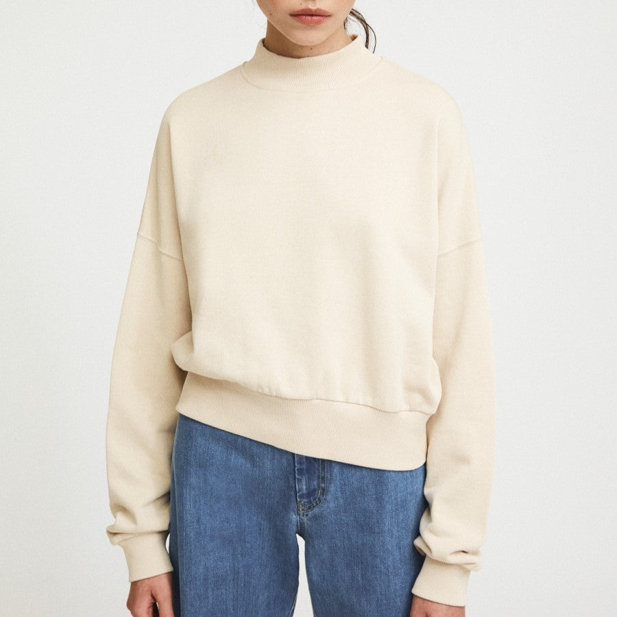 Natural beige white cream Pia sweatshirt from Rita Row with a drop shoulder and wide hem, sustainably made for the cold winter months.