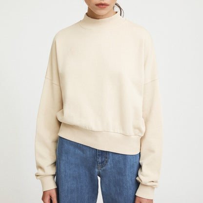 Natural beige white cream Pia sweatshirt from Rita Row with a drop shoulder and wide hem, sustainably made for the cold winter months.