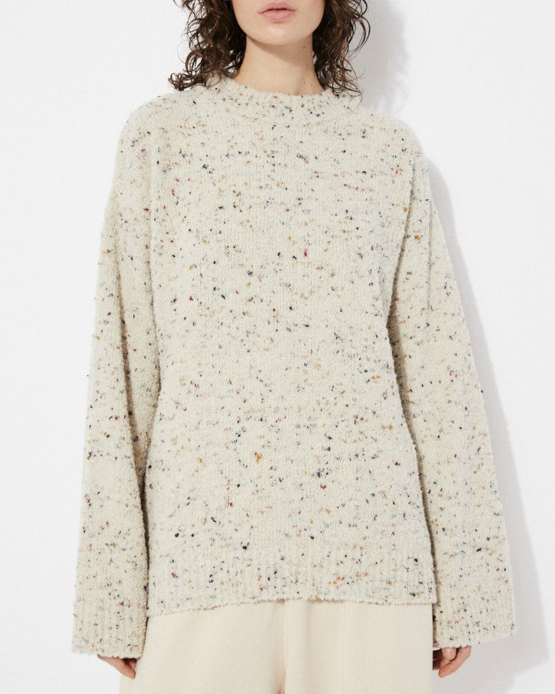 Saloria cream knit sweater with speckled flecks of color throughout. Made by Rita Row in Spain.