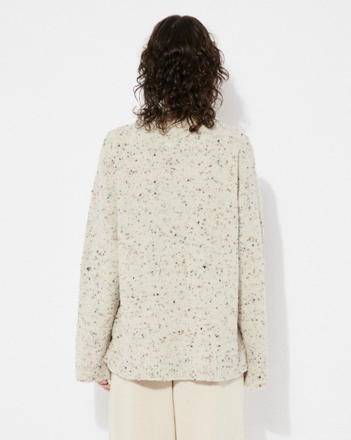 Saloria cream knit sweater with speckled flecks of color throughout. Made by Rita Row in Spain.