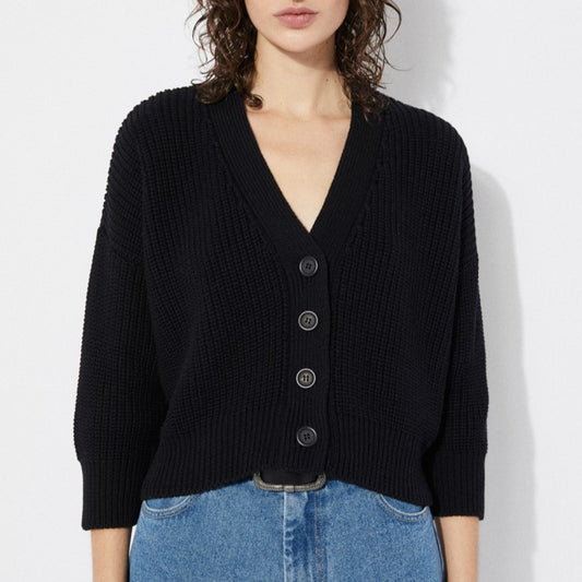 V-neck black knit Sclater cardigan with button-down front and v-neck. Made by Rita Row in Spain.