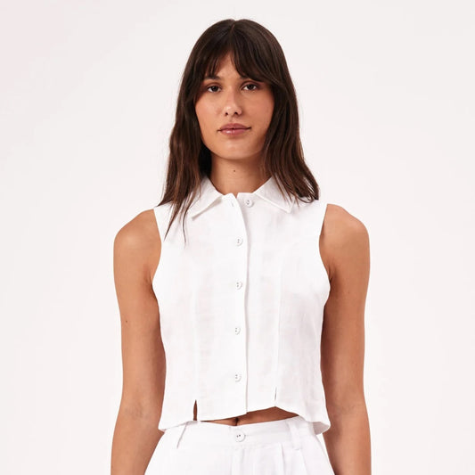 White cropped button-down collared top by Rolla's with a split seam detail and flattering fit.