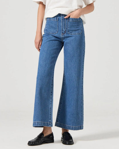 Rolla's Ashley blue sailor jean paired with a white tee and black leather loafers