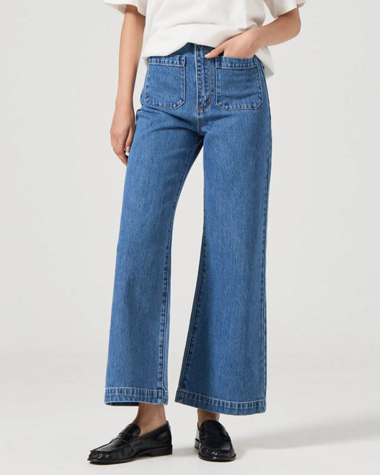 Rolla's Ashley blue sailor jean paired with a white tee and black leather loafers