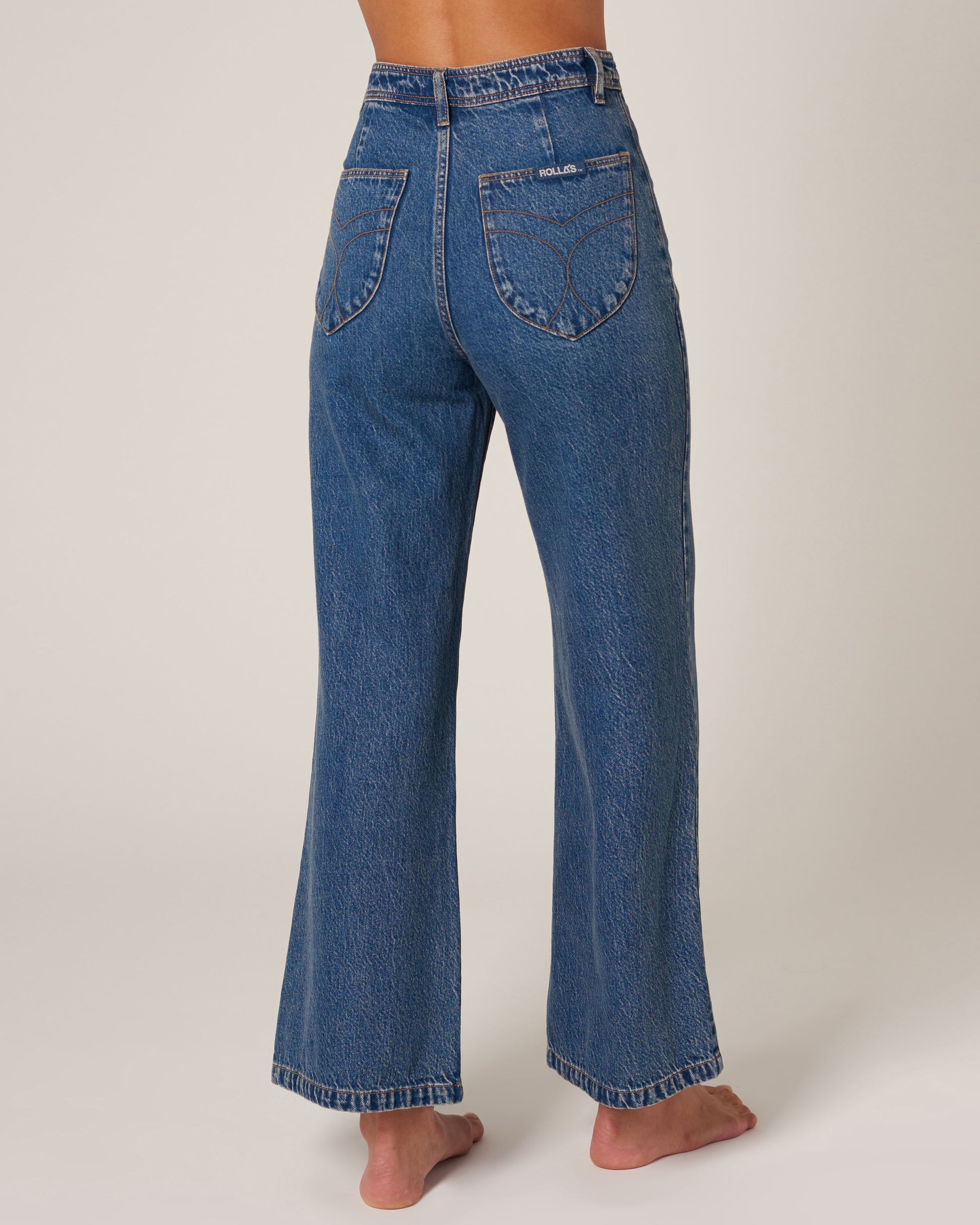 High-waisted wide leg denim blue jeans in a sailor style.