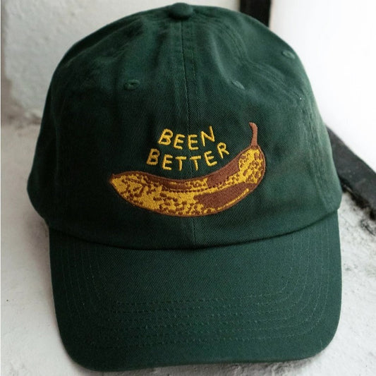 Been Better banana dad hat in hunter green from Stay Home Club at Clad, a sustainable clothing store in Asheville, NC