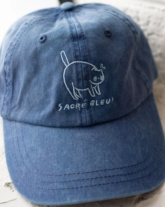Sacre Bleu dad hat from Stay Home Club in vintage dark denim