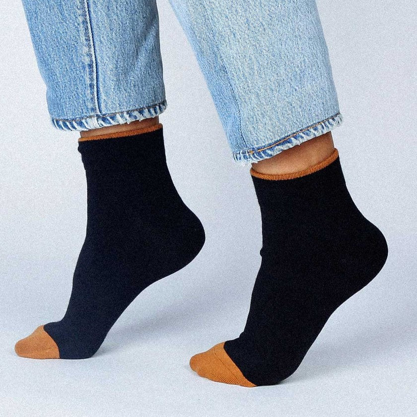 Black ankle sock with brown toe and hem by Tailored Union at Clad, a sustainable clothing shop boutique in Asheville, NC