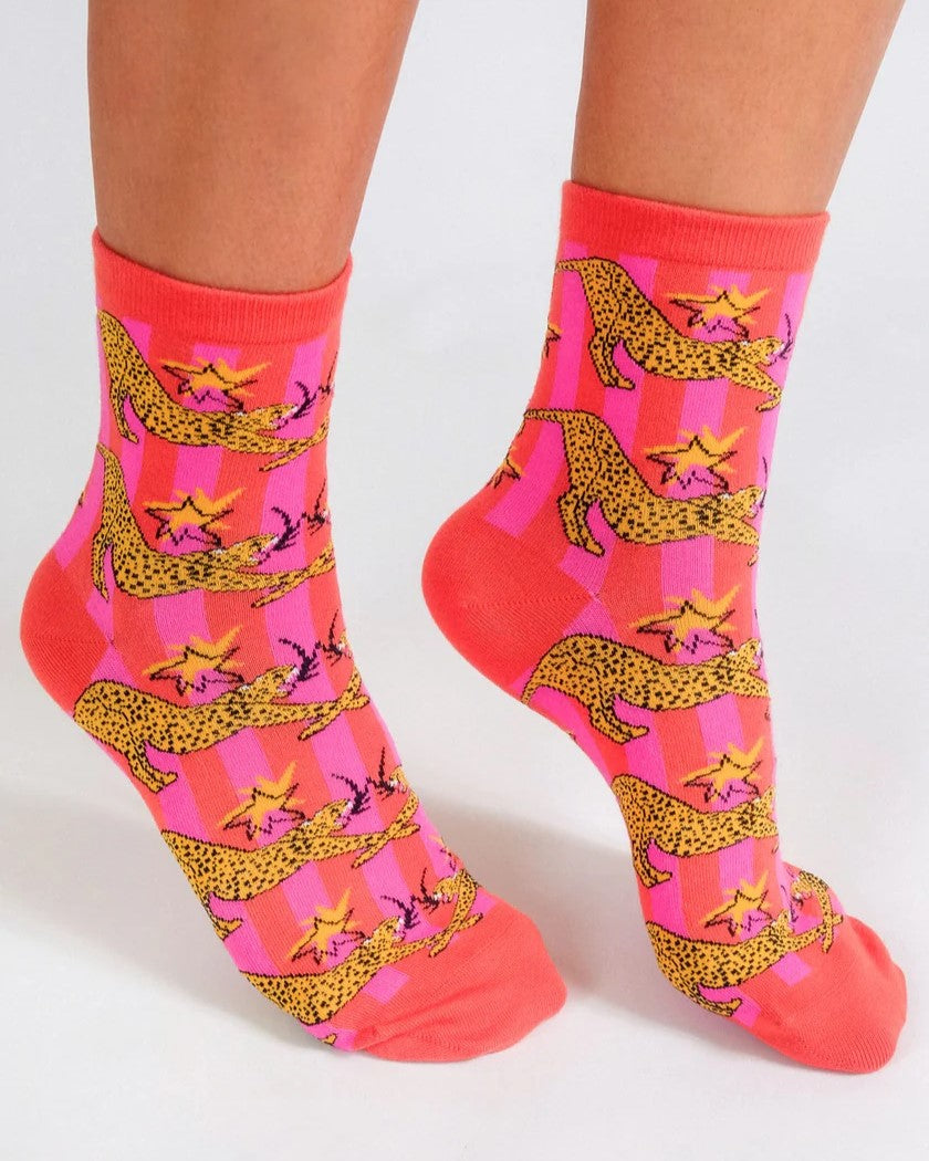 Pink and orange bright cheetah print sock by Mur for Tailored Union.