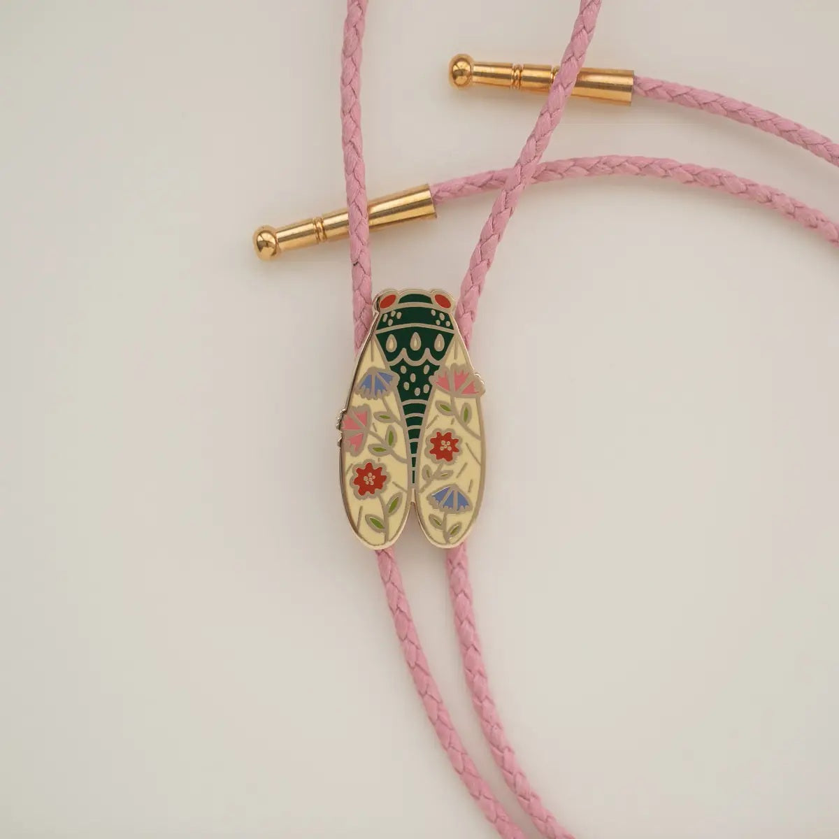 Cicada bolo tie with pink vegan leather cord
