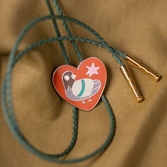 Pigeon bolo tie with vegan leather green cord