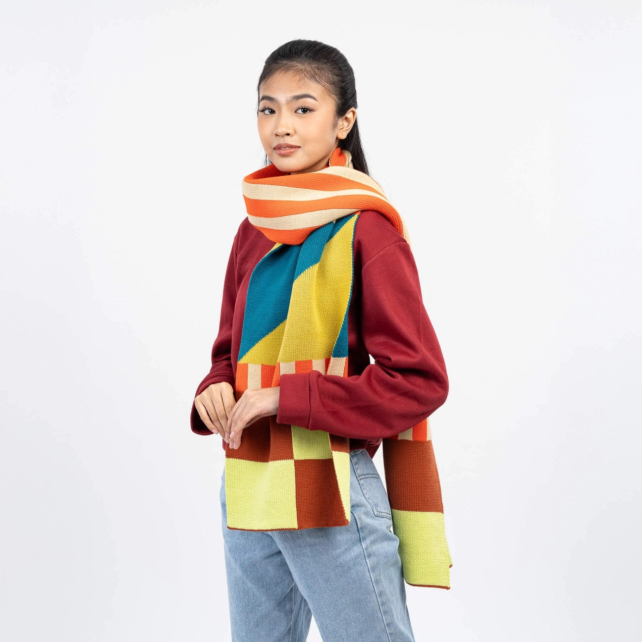 Verloop rust and lime knit kite scarf at Clad, a sustainable slow fashion clothing boutique in Asheville, NC