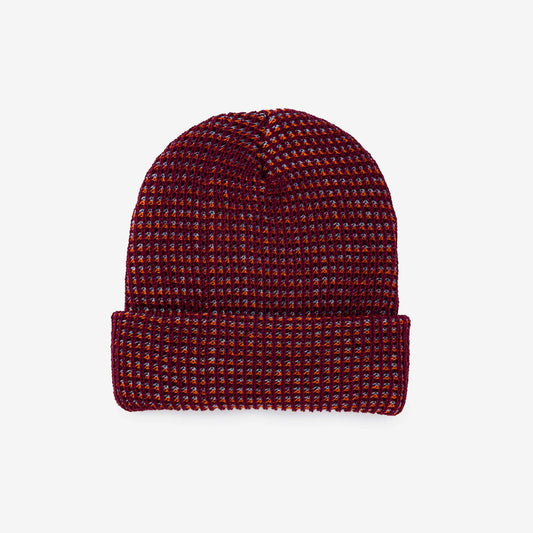 Wine red grid knit beanie made from deadstock yarn by Verloop Knits.