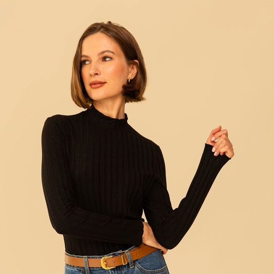 Mock neck long sleeve fitted Gigi Top by Whimsy & Row in black. Paired with denim and a cognac belt