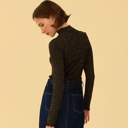 Sparkle black gigi top with mock neck and lettuce frill sleeve from Whimsy and Row