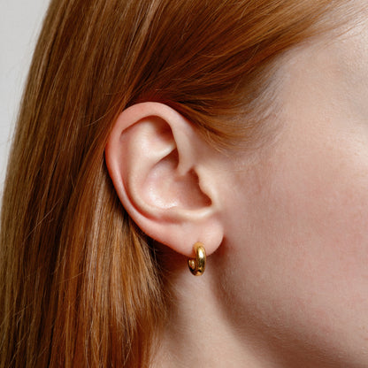 Gold-plated small everyday hoops by Wolf Circus.