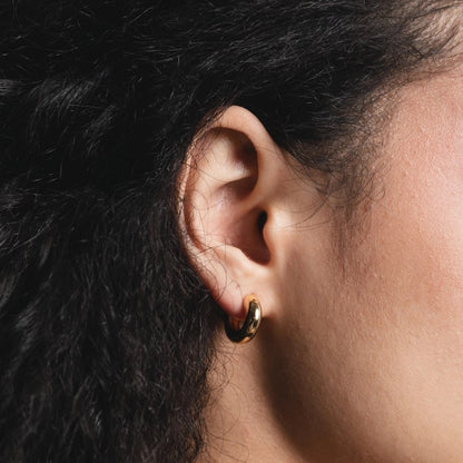 Classic gold hoop donut earring from Wolf Circus