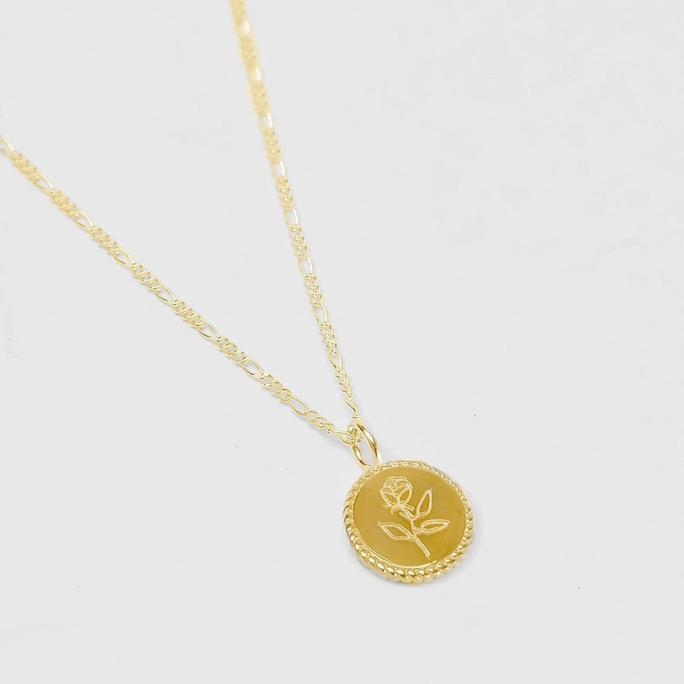Rose coin charm necklace by Wofld Circus with figaro gold chain